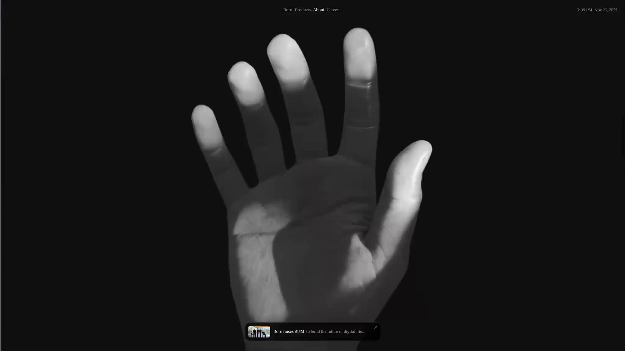 Born’s website with its three-dimensional hand on a dark canvas.